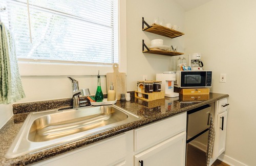 Memphis House | Centrally Located Memphis Tiny Home Queen Bed REAR