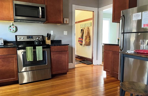 Oakdale Condo | Centrally located off Back Cove, 1st floor 4 bedroom, 1.5 Bath condo w/porch