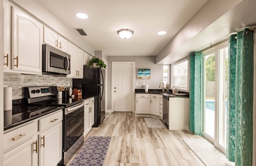 Palm River Estates House | Centrally Located/Sleeps 10/Heated Pool