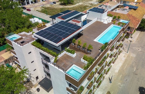 Santa Maria Huatulco Condo | Charming 2-bedroom condo minutes to the beach with 4 rooftop pools and BBQs