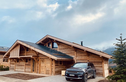 Superbolquere Ski Chalet | Chalet Aguila 5* (NEW) sleeps 12 - XXL. jacuzzi and panoramic sauna
