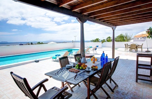 Playa Blanca Villa | Chalet Casa Paula with Sea and Mountain View, Pool, Garden & Wi-Fi