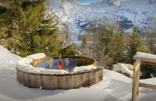 La Clusaz Ski Chalet | Chalet Fernuy - ski holiday for 10, hot tub & games room - OVO Network