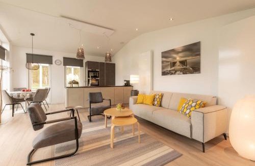 Wemeldinge House | Chalet in Zeeland with Garden and Fireplace