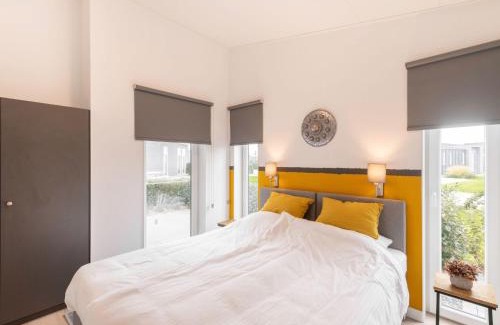 Wemeldinge House | Chalet in Zeeland with Garden and Fireplace