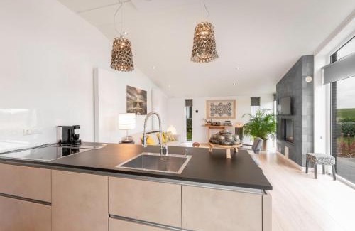 Wemeldinge House | Chalet in Zeeland with Garden and Fireplace