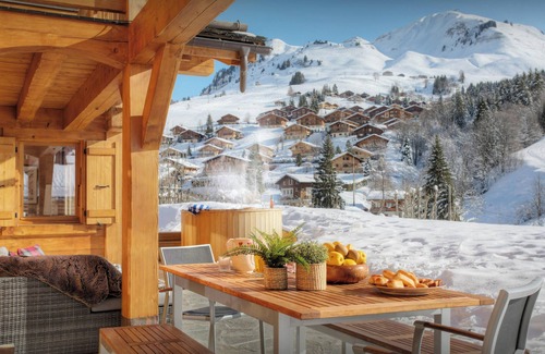 Le Chinaillon Ski Chalet | Chalet Tolar - mountain holiday base, hot tub and piste view - OVO Network