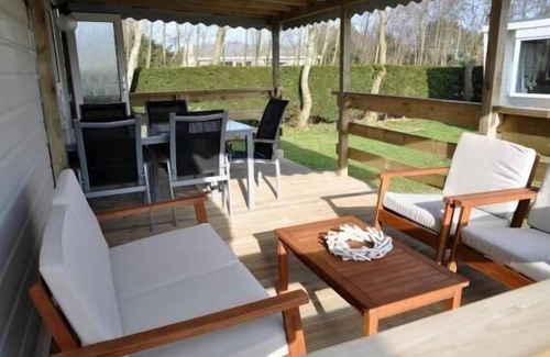 Buren Apartment | Chalet with a roofed veranda near the beach