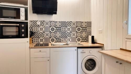 Les Hauts de Saint-Aubin Apartment | Chaleureuse Échappée : Commodités, Calme, Confort