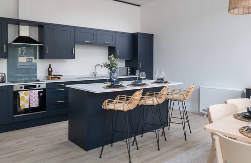 Saint Asaph Apartment | Chapel renovation Free on-site parking Zip-link beds Double sofa bed