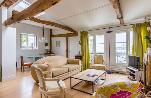 Enfants-Rouges Apartment | Character in the Marais, by Veeve