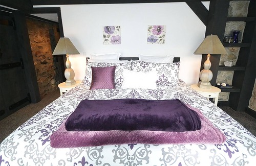 Charlevoix Villa | Charlevoix Mushroom Thatch House. Walk to Downtown. Beach Across the Street!