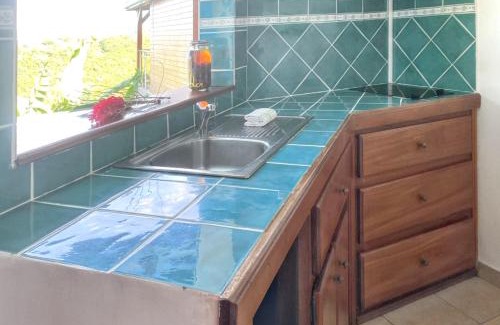 Marigot House | Charmant Bungalow avec vue sur la mer à Marigot, 60 m², piscine.
