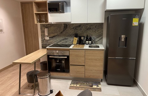 Chapinero Apartment | Charming 1-bedroom apartment with private parking and fitness room in Bogotá