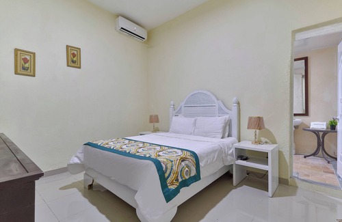 San Anton Hotel | Charming 1BR Hotel Room in Historic Zona Colonial with WiFi and AC