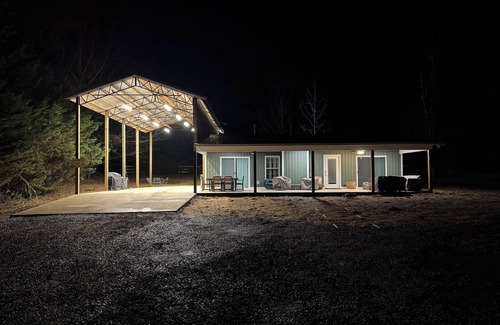 Guntersville Cabin | Charming 2-bed 2-bath cabin with views of Lake Guntersville from every room.
