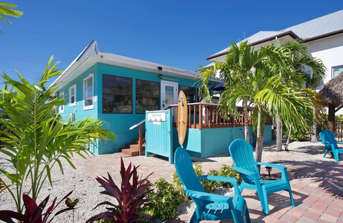 Fort Myers Beach House | Charming 2-Bed Home with Pool, Tiki Hut, Canal Access, & Steps to Beach & Dining