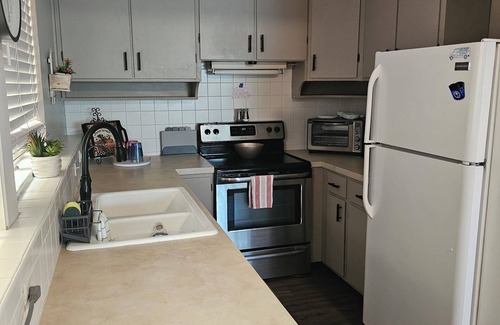 Windsor Apartment | Charming 2-bedroom apartment with AC, WIFI, Security Cameras at entrances.