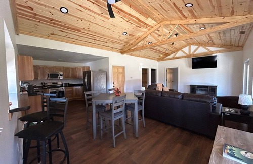 Logan Cabin | Charming 2-bedroom cabin with AC, WiFi, hot tub, and firepit in beautiful Logan