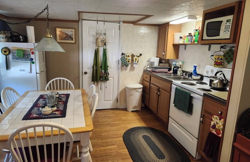 Fishertown Cottage | Charming 2-bedroom cottage near Bedford, screened porch deck & private setting