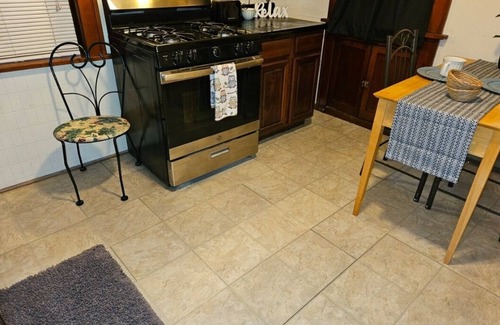 St. Louis House | Charming 2-bedroom, cozy bungalow with sunroom in fabulous St. Louis with WiFi