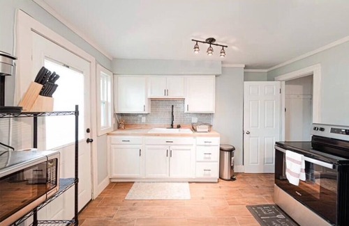 Evansville House | Charming 2-bedroom townhome with fenced backyard in fabulous Evansville.