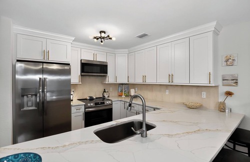 Ozona House | Charming 2-bedroom house in peaceful Palm Harbor with coffee bar