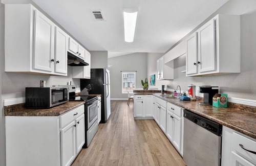Biltmore Beach House | Charming 2-bedroom townhome feet from the Beach