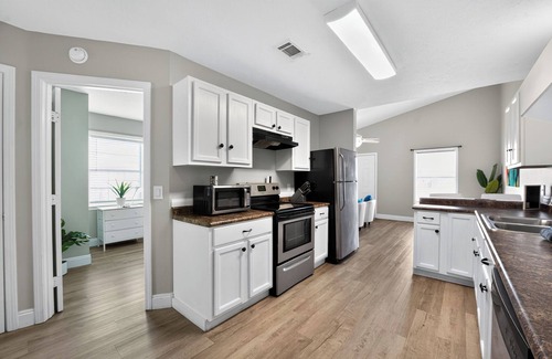 Biltmore Beach House | Charming 2-bedroom townhome feet from the Beach