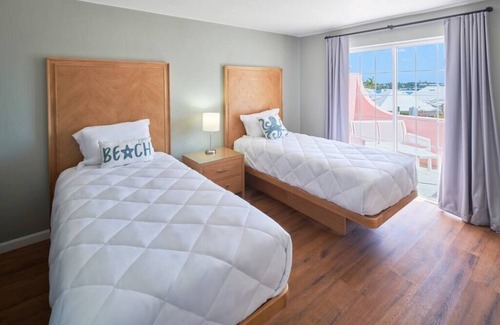 St. George's Cottage | Charming 2BR Cottage with Poolside View