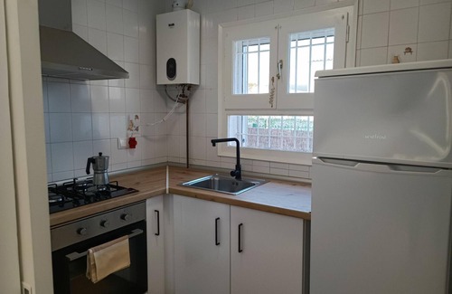 Calafat House | Charming 3-Bedroom House Near Port Calafat Beach, Terrace & BBQ, Perfect for Families