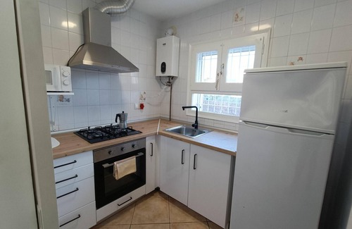 Calafat House | Charming 3-Bedroom House Near Port Calafat Beach, Terrace & BBQ, Perfect for Families