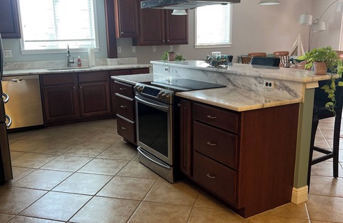 Englewood Condo | Charming 3-bedroom 2.5-bath condo on a canal with elevator and pool!