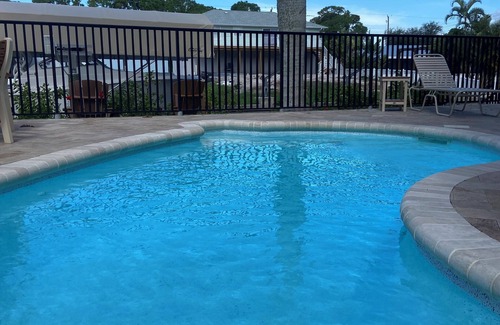 Englewood Condo | Charming 3-bedroom 2.5-bath condo on a canal with elevator and pool!