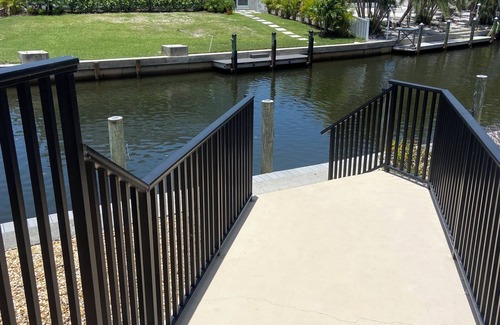 Englewood Condo | Charming 3-bedroom 2.5-bath condo on a canal with elevator and pool!