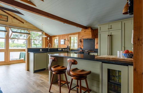 Naples Cabin | Charming 3-bedroom cabin with private sandy beach and dock