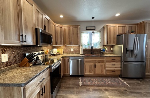 Ironwood House | Charming 3-bedroom home in Ironwood with custom tiled showers. Dog-Friendly.