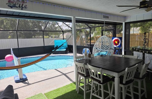 Port Saint Lucie House | Charming 3-br Poolhouse sleeps 15 near beaches, family games to keep night going