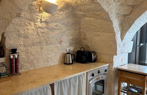 Locorotondo Villa | Charming 300-Year-Old Trullo with Large Private Pool, Garden, Pizza Oven & BBQ