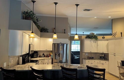 Port Richey House | Charming 4 bdrm house in gated, exclusive neighborhood w/large heated pool.