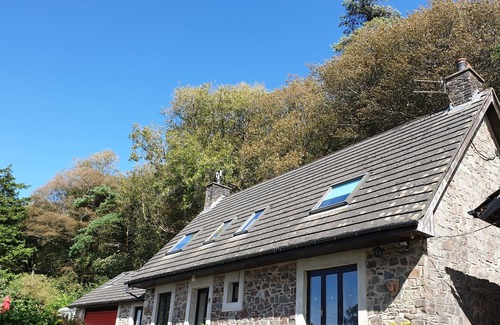 Ferryside House | Charming 4-bedroom cottage with fabulous sea views and large grounds.
