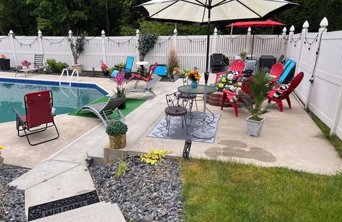 Neshannock Township House | Charming 4-bedroom house with fitness room and AC in New Castle.