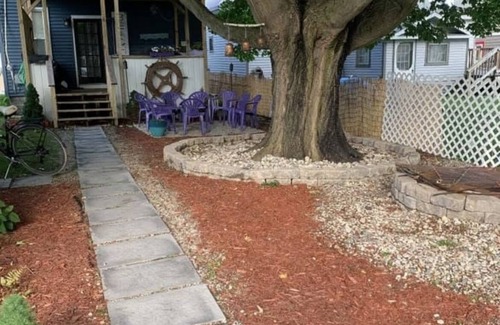 Ludington House | Charming 4-bedroom house sleeps 15 in the wonderful beach town of Ludington!