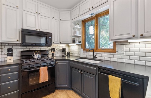 Downtown Omaha House | Charming 4-bedroom house 2 bath house - 10 minutes from CWS in welcoming Omaha