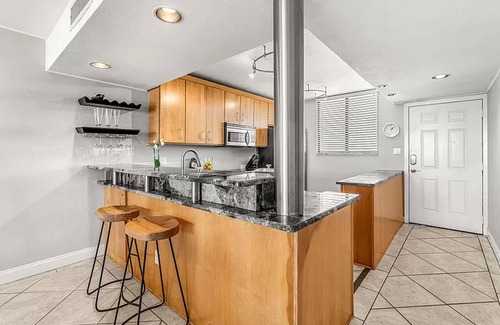 Columbiad Plaza Condo | Charming 5th floor 2-bedroom condo with views of canal, river and Port Canaveral