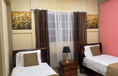 Basseterre Bed & Breakfast | Charming 7-bedroom B&B with AC and WiFi in Basseterre, KN