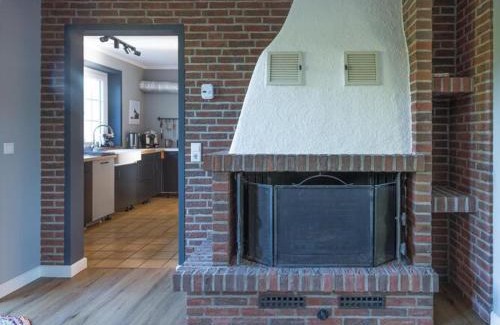 Aventoft Apartment | Charming and cozy holiday home with a fireplace