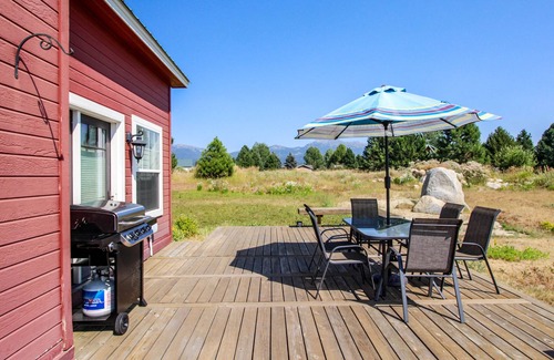 McCall House | Charming and spacious country home with furnished back deck and mountain view