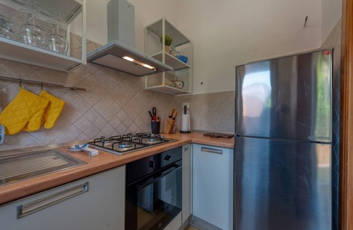 Giorgilorio Apartment | Charming apartment in a villa of about 60 sqm, able to accommodate up to 4 people, located on the mezzanine floor (accessible via steps).The house is located in Surbo, a town a few km from Lecce, in a residential but well-served area. In about 10 minutes