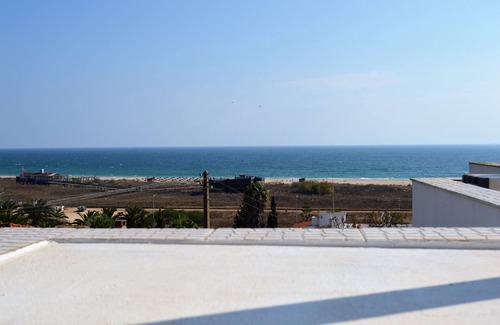 Meia Praia Apartment | Charming Apt w/roof terrace and stunning views. 2 min walk to Beach/restaurants